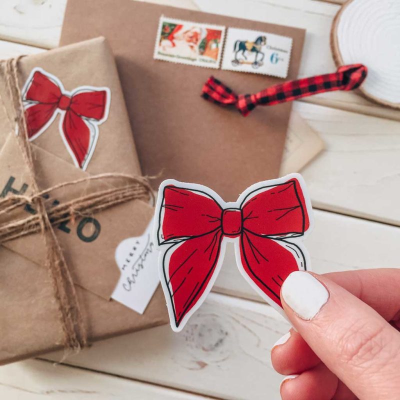RED BOW STICKER – OPTICAL LIFT